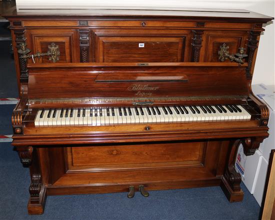 A late Victorian rosewood cased Bluthner upright piano, W.5ft 2in. D.2ft 3in. H.4ft 3in.